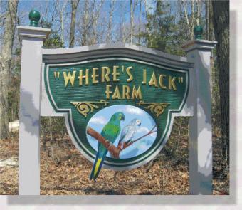 Farm signs carved and hand painted